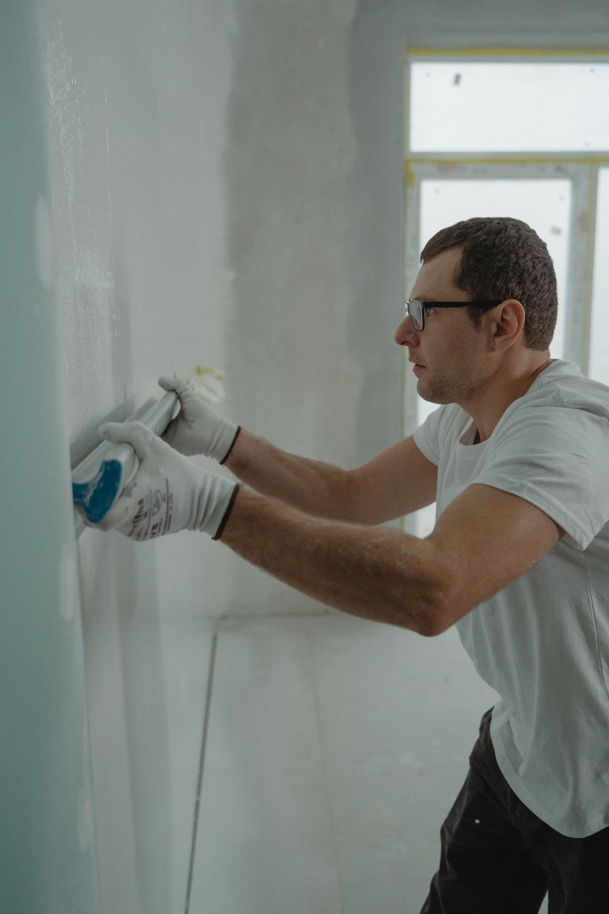 Rebuilding drywall and finishes after water-damage mitigation